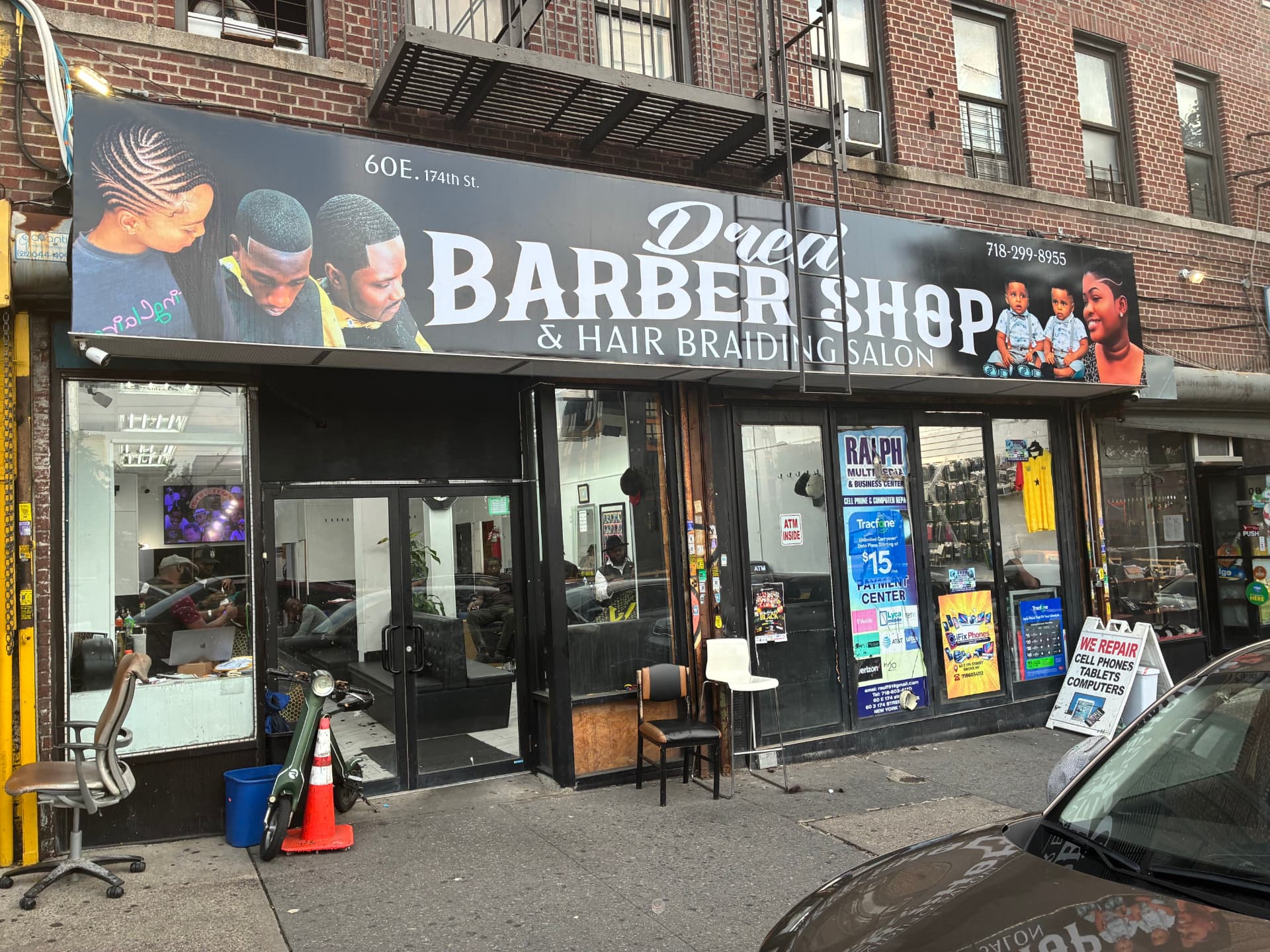 The entrance to Dred African Barbershop & Hair Braiding Salon at 60 E 174th St, Bronx
